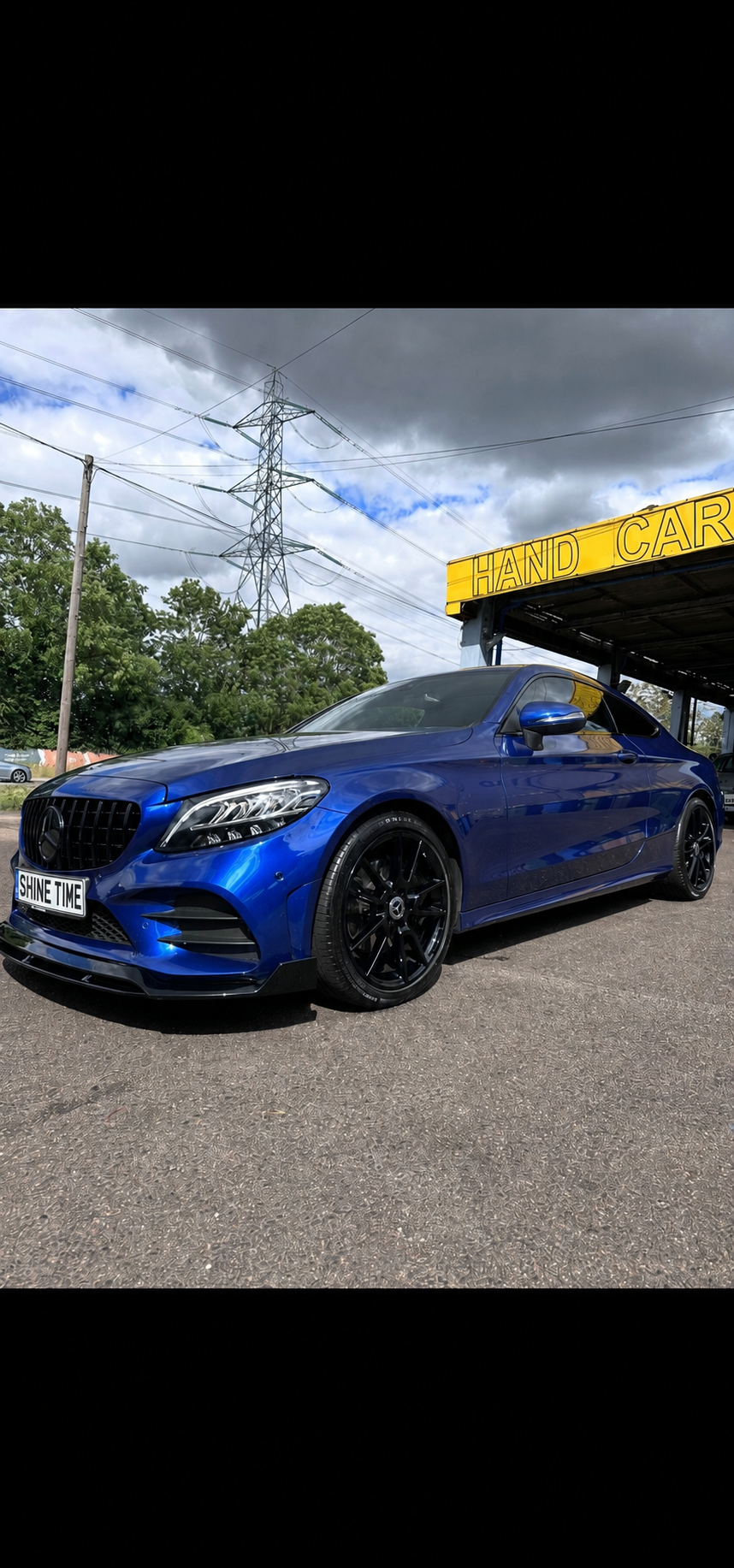 Freshly washed blue Mercedes coupe at Shine Time Hand Car Wash